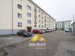 DOM-REALÍT ponúka veľký tehlový dvojizbový byt s parkovaním na Prievozskej ulici s garážou