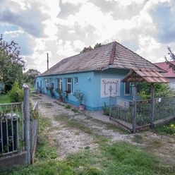 Na predaj dom s pozemkom 1981m2 v obci Radava, 4 km od Podhájskej