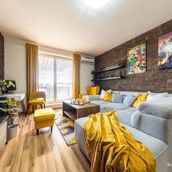 Veľkometrážny 2 izbový byt s balkónom v novostavbe na ulici Budatínska